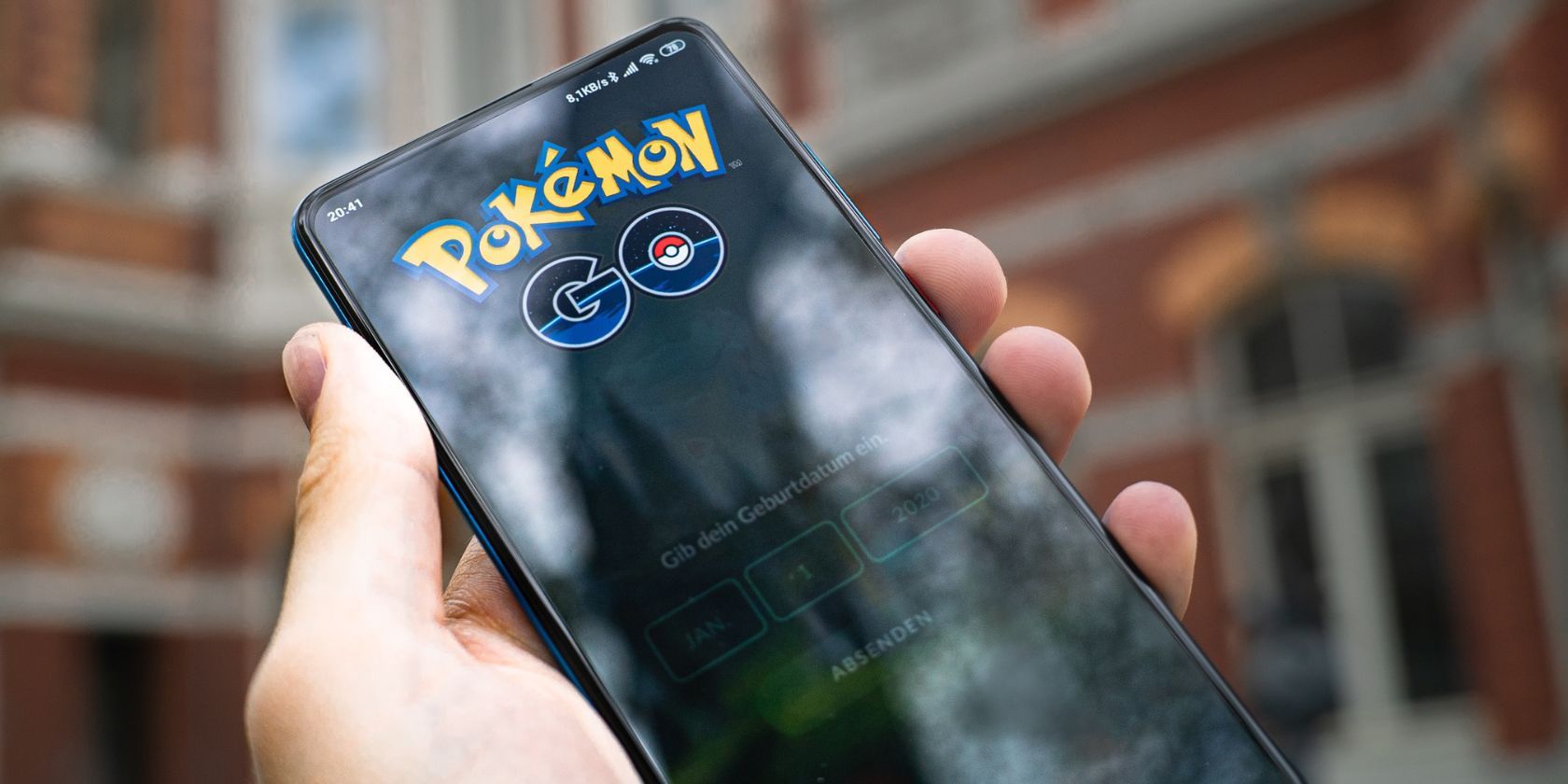 Person playing Pokemon Go outdoors