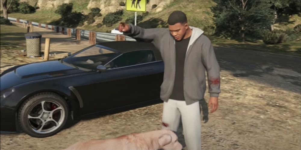 Franklin spricht in GTA V mit einem Hund neben einem Auto