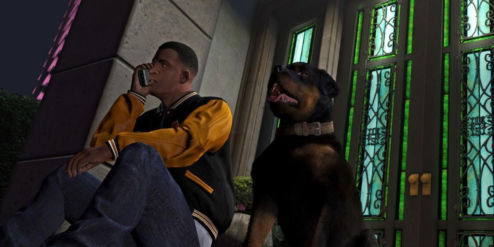 Franklin und Chop sitzen in GTA V auf einer Treppe