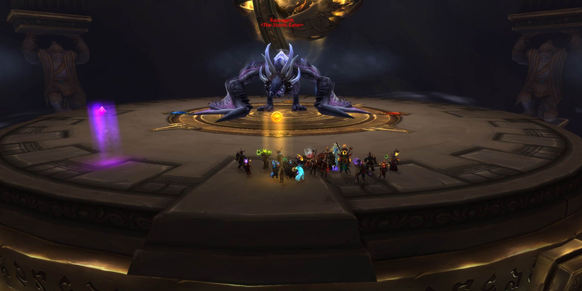 World of Warcraft – ein Raid-Team, das einem großen blauen Drachen gegenübersteht