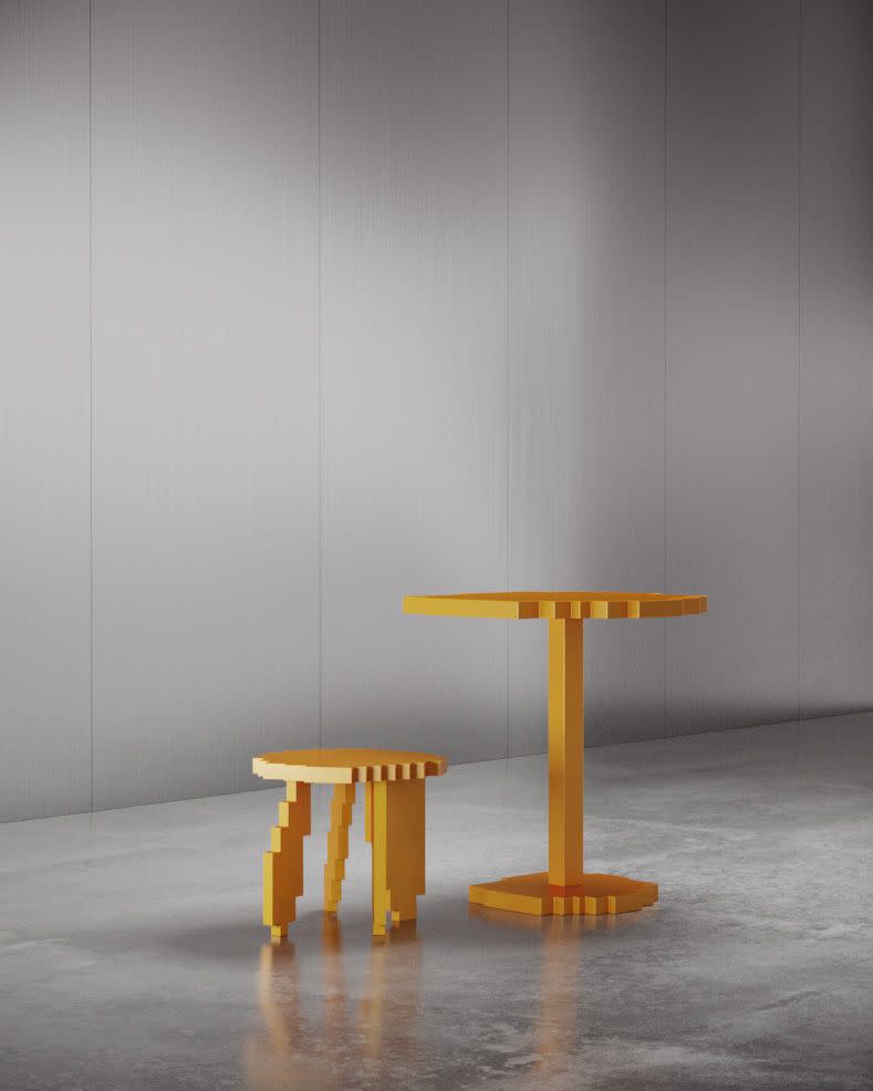 ein orangefarbener pixeliger Hocker und ein Tisch