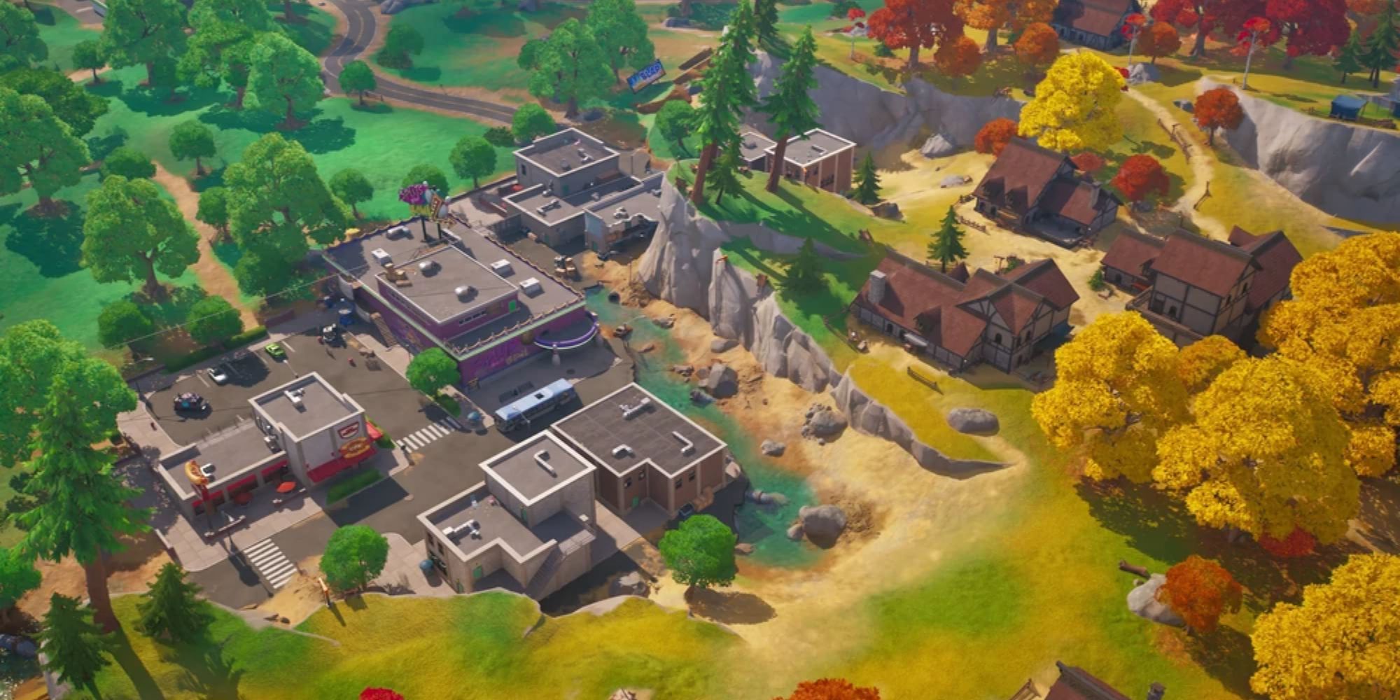 Eine geteilte Stadt in Fortnite Kapitel 4 namens Faulty Splits.  Die Hälfte dieser Stadt ist modern, während die andere Hälfte mittelalterlich ist