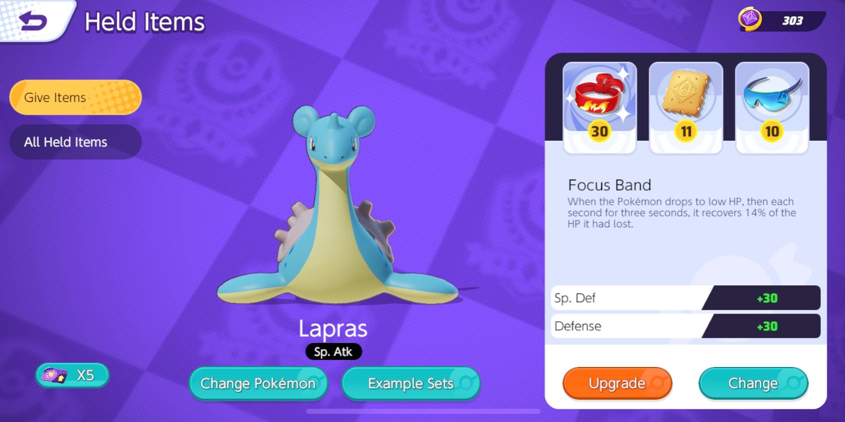 Lapras Auswahlbildschirm für gehaltene Gegenstände mit Focus Band, Aeos Cookie und Sp.  Angriffsspezifikationen, die in Pokemon Unite ausgewählt wurden.