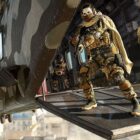 soldiers-on-plane-with-guns