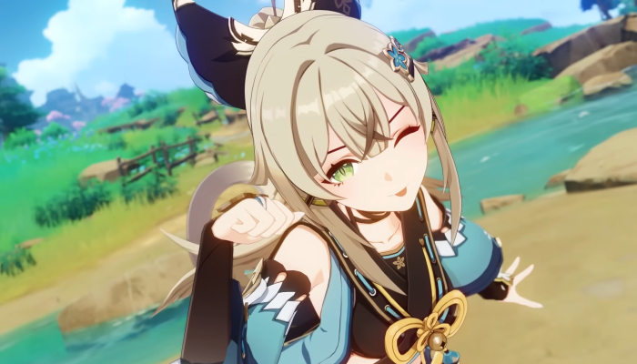 Kirara zwinkert in die Kamera, streckt die Zunge heraus und krümmt ihre rechte Hand wie eine Katzenpfote.  Sie steht an einem Bach in Inazuma.