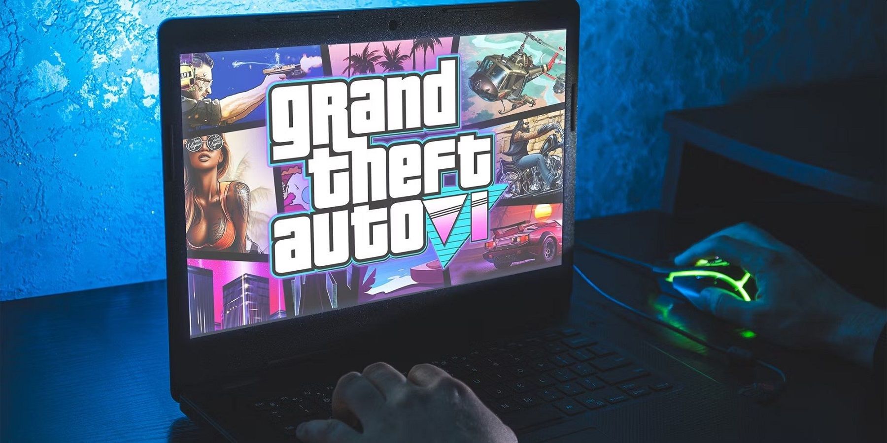 Foto eines Laptops mit einem Bild im Grand Theft Auto 6-Stil auf dem Bildschirm.