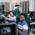 competitive gamers in front of computers