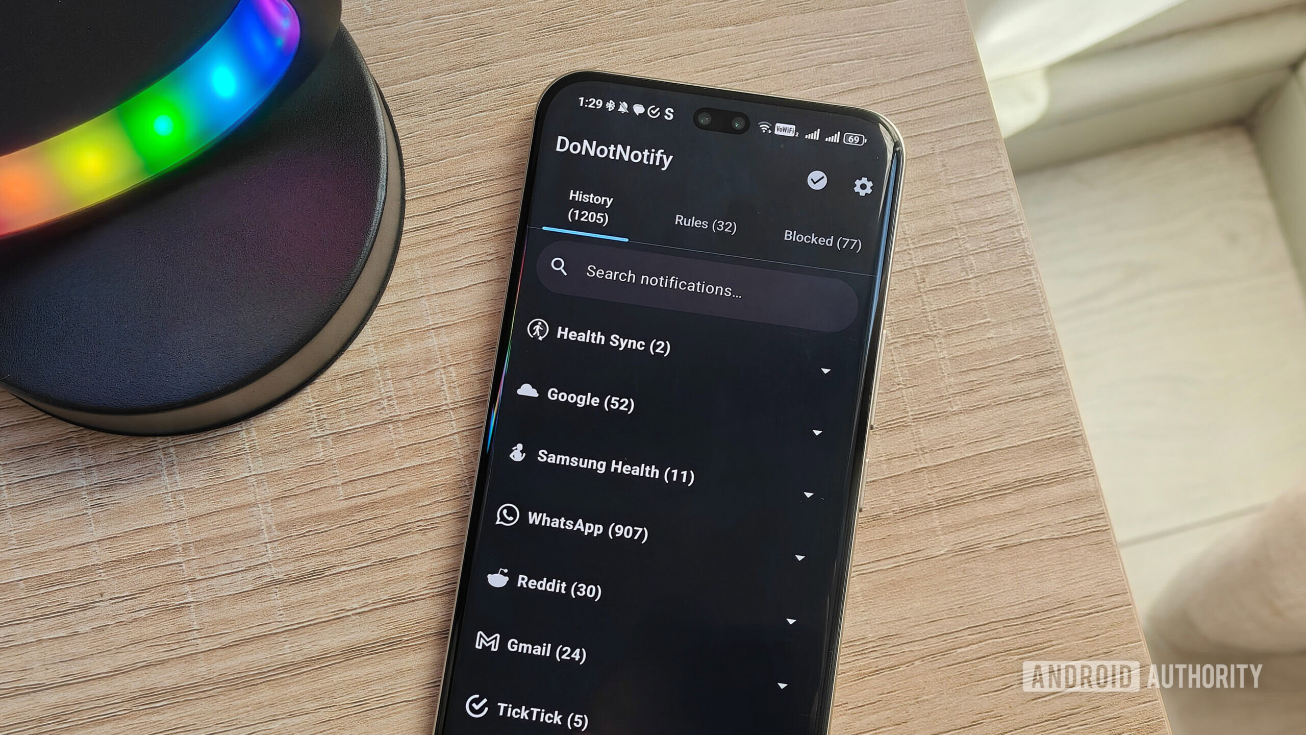 donotnotify app on a smartphone with an LED lamp